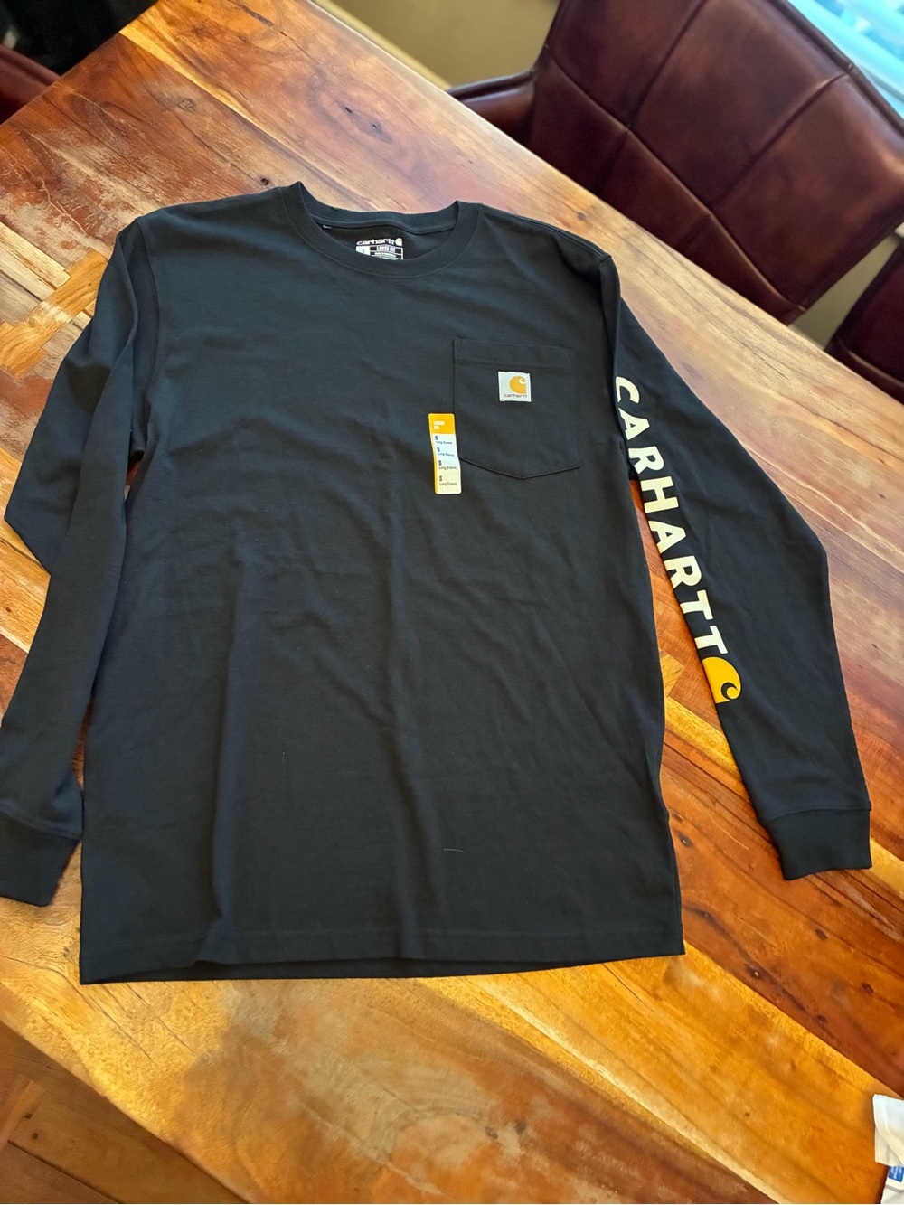Carhartt Black Long-Sleeve Pocket Tee with Yellow Logo Sleeve